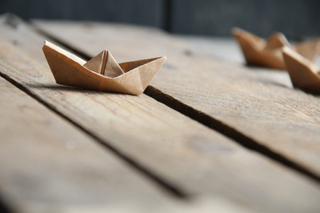 Paper boats on a vintage background.の写真素材