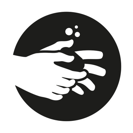 Washing hands icon or sign. Hands are holding soap. Round icon.のイラスト素材