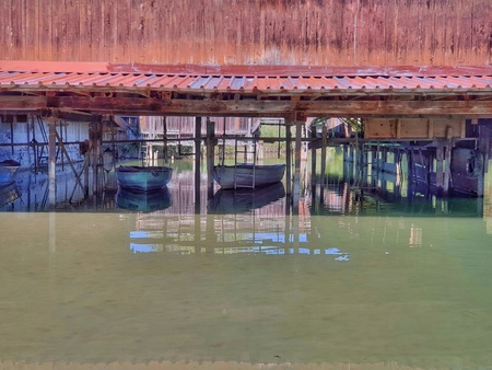 Boathouse on the brook Aabach at the historic Badeeanstalt in Robenhausen near Wetzikon, Switzerland.のeditorial素材