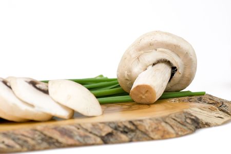 Fresh mushroom with chives on whiteの写真素材