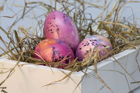 Withe box with colored easter eggsの写真素材