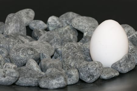 Easter eggs with stonesの写真素材