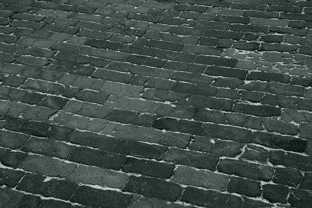 abstract background with dark gray paving stones