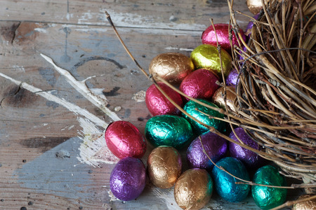 Chocolate easter eggs wrapped in coloured aluminium foilの写真素材
