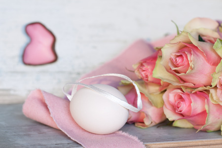 Easter still life with a bouquet of rosesの写真素材
