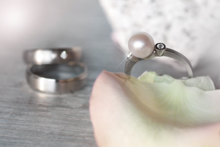 Stylish arrangement of wedding ringsの写真素材