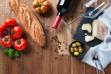Still life with wine and ingredients for an Italian appetizerの写真素材