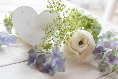 Love greetings with flower decoration in vintage style for mothers dayの写真素材