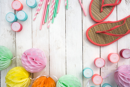 Colorful Summer accessories for a beach party on white planksの写真素材