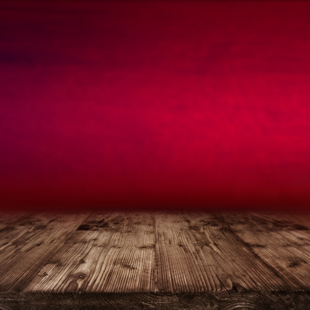 Red backdrop with wooden stage for a valentines day decorationの写真素材