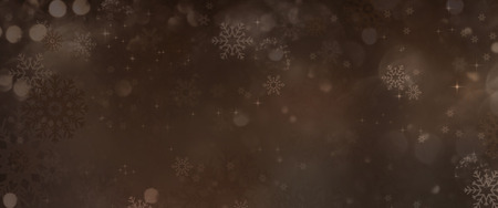 Gold brown christmas background with snowflakes and festive bokehの写真素材
