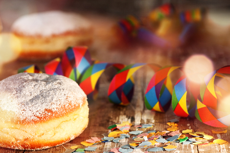 Donut with colorful carnival decoration and short depth of fieldの写真素材