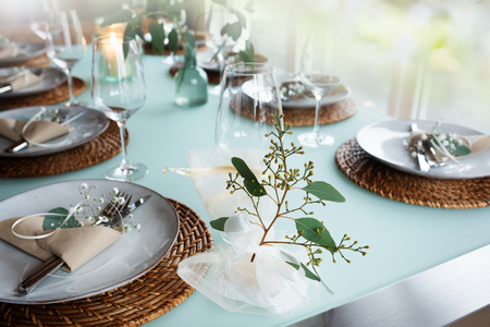 Festive table setting for a romantic wedding eventの写真素材