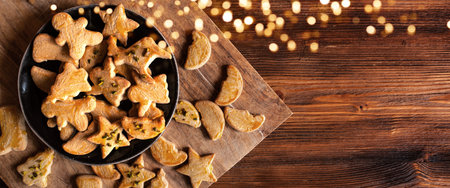 Homemade christmas pastry decorated on old rustic wood  top view