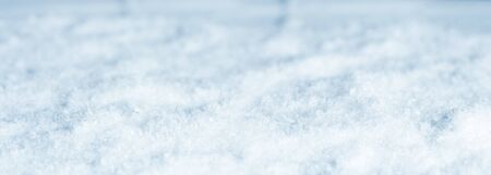 Winter snow texture blue white ice crystals background for a christmas advertising spaceの写真素材