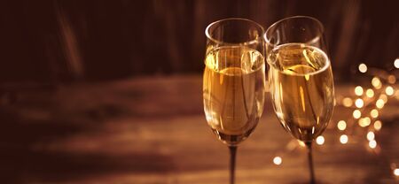 Champagne for celebration with golden bokeh on celebration background for christmas and new yearの写真素材