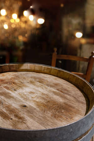 Atmospheric background with short depth of field and bokeh lights for a wine tasting.の写真素材