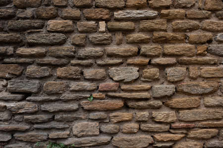 Old weathered stone wall view. Background with space for text.の写真素材