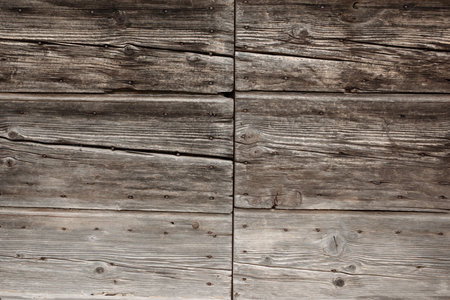 Weathered sepia colored wood background for a product placement. Summer architecture outside in boho design. Top view with space for text.の写真素材