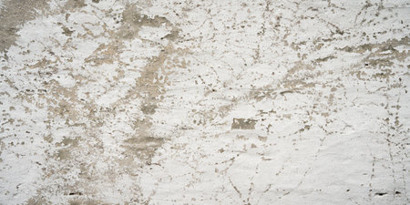 Peeling white paint on an old house wall. Background for a weathered old wall structure. space for text.の写真素材