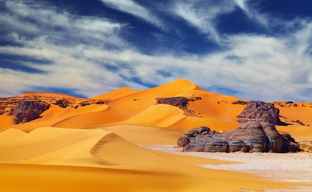 Sand dunes and rocks, Sahara Desert, Algeriaの写真素材