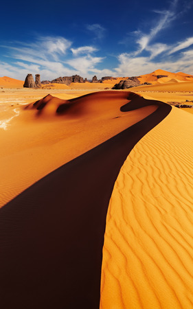 Sand dunes and rocks, Sahara Desert, Algeriaの写真素材