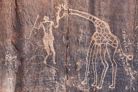 Ancient rock engraving in Sahara Desert, Tadrart, Algeriaの写真素材