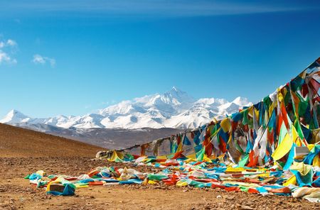 Buddhist prayer flags and mount Everest on backgroundのeditorial素材