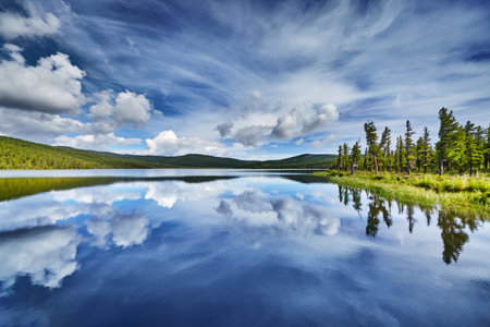 Beautiful still lake with reflection in Altai mountains