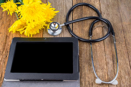 concept flowers on wooden table with copy space for word or textの写真素材