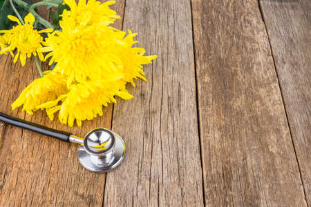 concept flowers on wooden table with copy space for word or textの写真素材