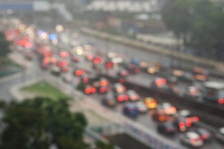 blurred image - traffic jam with vehicles during heavy rainの写真素材