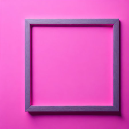 Empty picture frame on a pink background. Minimalism concept.の写真素材