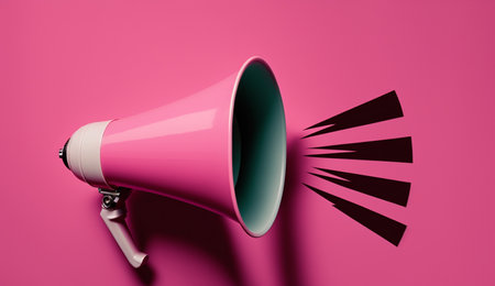 Megaphone on pink background with copy space. 3D renderingの写真素材