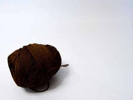 black knitting yarn on a white background