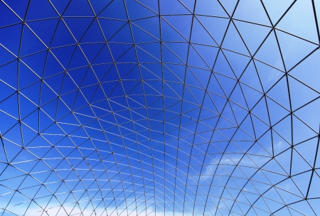 The structural steel structure against a clear blue sky in the background の写真素材