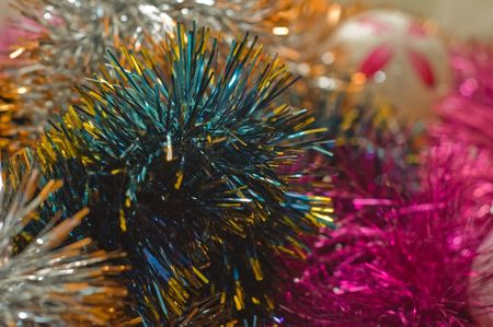 Christmas tree tinsel and Christmas tree ball on backgroundの写真素材