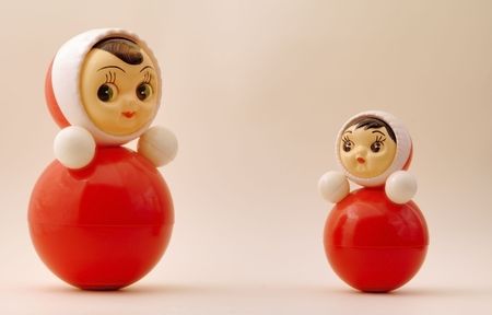 Photo of two nice plastic tilting dolls (tumblers)の写真素材
