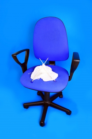 Knitting is on an office chairの写真素材