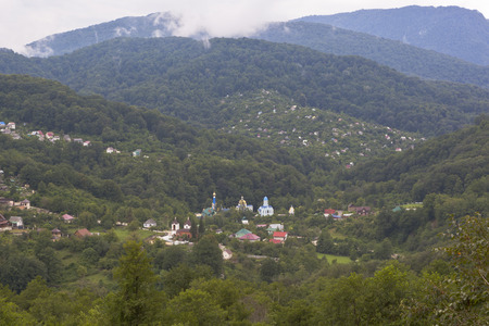 View on the village Lesnoye and Trinity-Georgievskiy female monastery in Adler district of Sochi, Krasnodar region, Russiaの写真素材