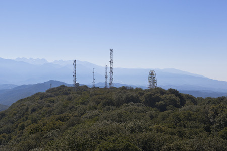 Cell towers and Ferris wheel on the mountain Big Ahun, Sochi, Krasnodar region, Russiaの写真素材