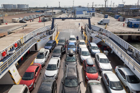 Loading of cars on the ferry Elena in the port of Caucasus, Krasnodar region, Russiaのeditorial素材