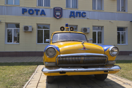 GAZ-21 "Volga" police car near the building of the DPS company in the settlement of Dzhemete, Anapa, Krasnodar region, Russiaのeditorial素材