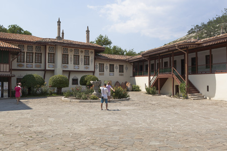 Bakhchisaray, Crimea, Russia - July 22, 2019: Palace Square of the Bakhchisaray Khan Palace with a view of the Residential Chambers and the Suite building, Crimeaのeditorial素材