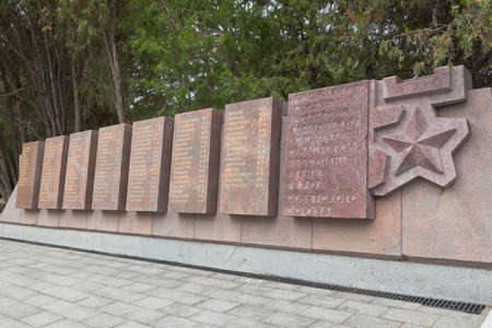 Sevastopol, Crimea, Russia - July 28, 2020: Memorial wall with the names of 240 Heroes of the Soviet Union awarded this title for the liberation of Sevastopol in the memorial complex Sapun-Gora in the hero city of Sevastopol, Crimeaのeditorial素材