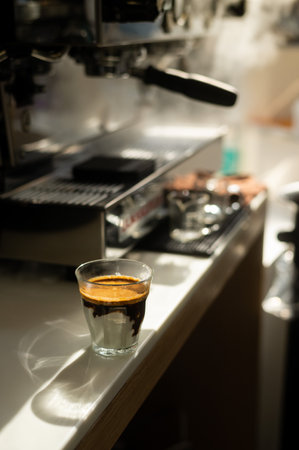 Coffee machine making espresso in a cafe, shallow depth of fieldの写真素材