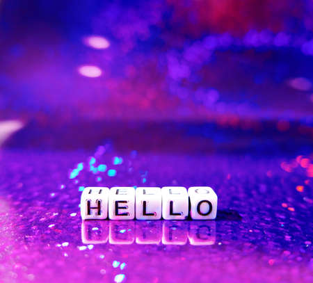 word hello made from cubes on holographic background. Reflection, glare, blue, pinkの写真素材