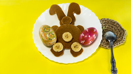 Pancakes with Easter bunny, creative Easter breakfast idea for kids. Happy Easter. Spring.の写真素材