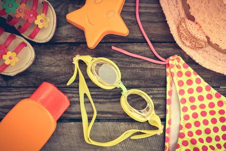 beach accessories on the old wooden background. Toned image.の写真素材