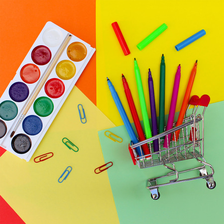 Shopping cart with stationery objects. Office and school supplies. back to school.の写真素材
